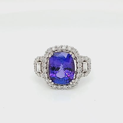 Cushion-Cut Tanzanite and Diamond Halo Three Stone Ring