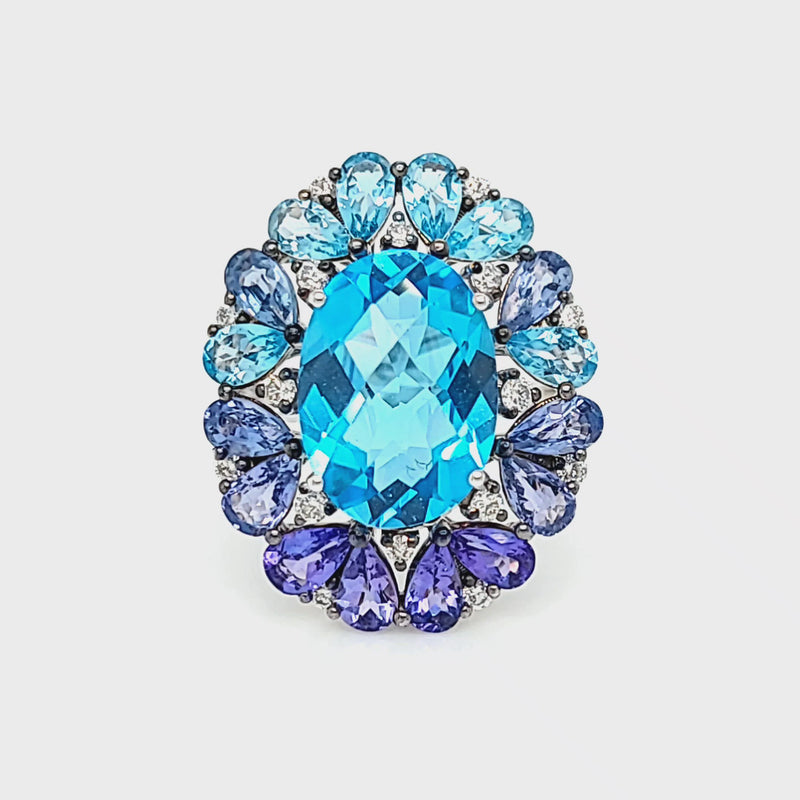 Oval Blue Topaz with Pear Tanzanite & Sapphire Halo Ring