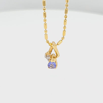 Pear Shaped Tanzanite Pendant with Diamond Accent