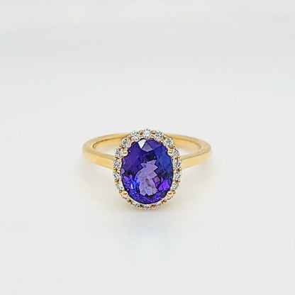 Oval Tanzanite & Diamond Halo Yellow Gold Ring