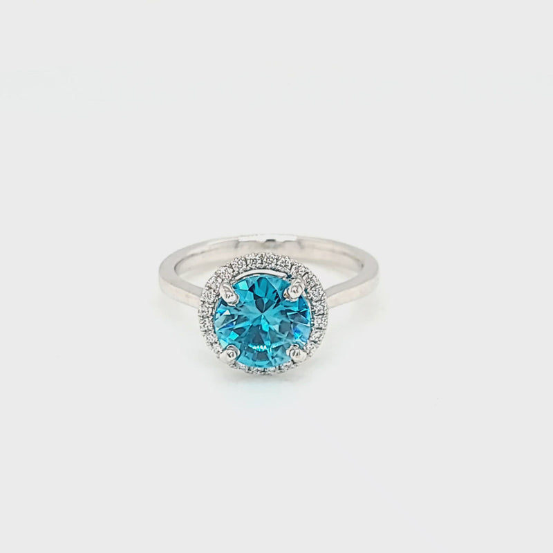 Blue Zircon Halo and Diamond Accented Ring