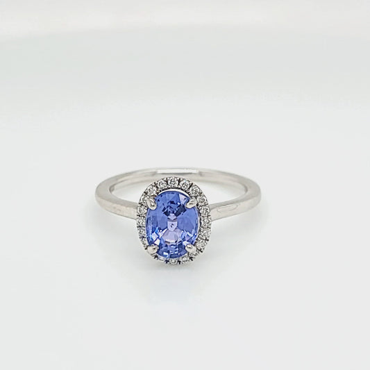 Oval Tanzanite and Diamond Halo Ring