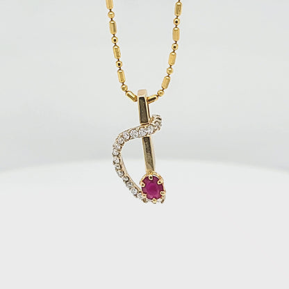 Oval Ruby and Diamond Swirl Pendant