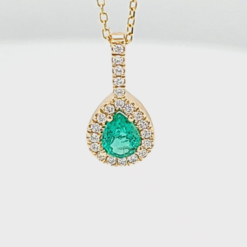 Pear Shaped Emerald Pendant with Diamond Halo