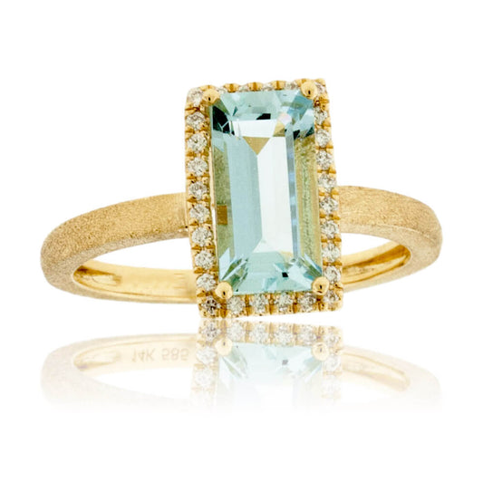 Baguette-Cut Aquamarine in Yellow Gold with Diamond Halo Ring - Park City Jewelers