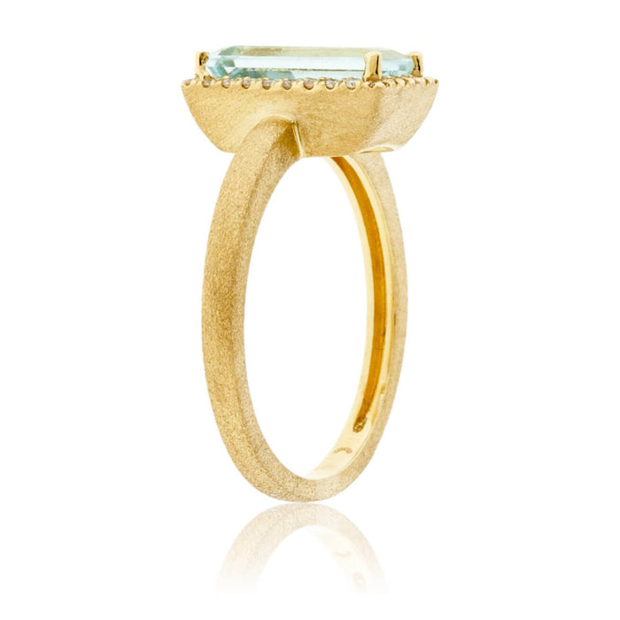 Baguette-Cut Aquamarine in Yellow Gold with Diamond Halo Ring - Park City Jewelers