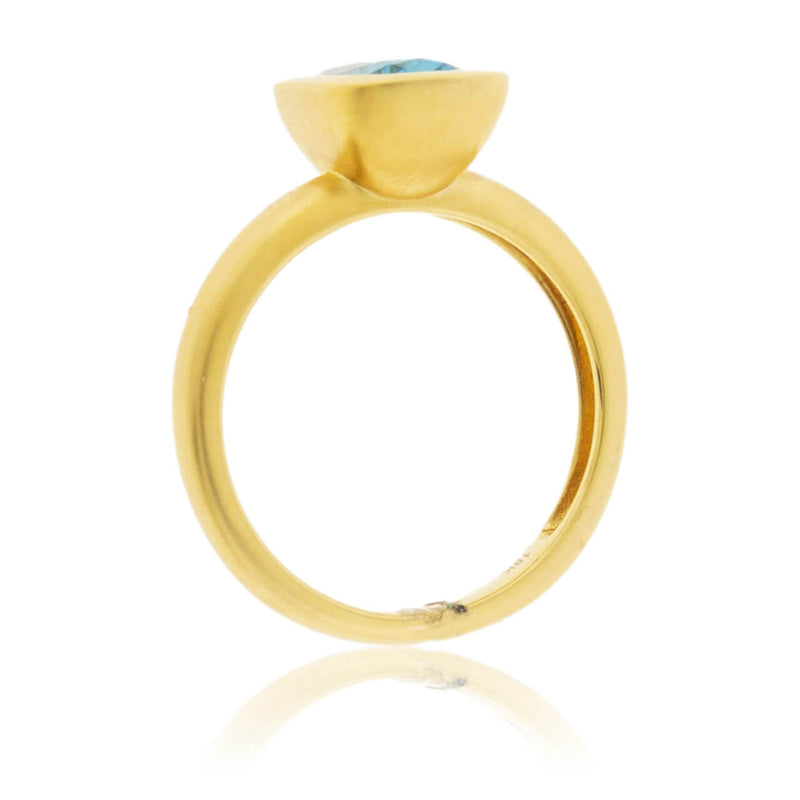 Bezel Set Modified Cushion-Cut Blue Zircon Yellow Gold Ring - Park City Jewelers