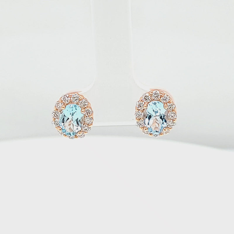 Oval Aquamarine and Diamond Halo Stud Earrings