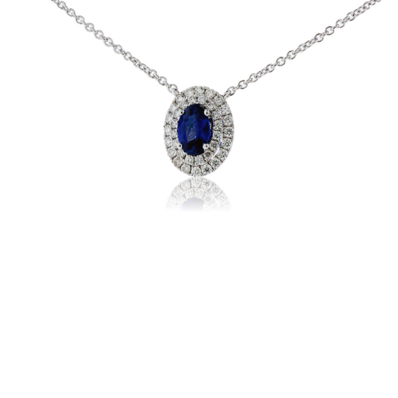 Blue Oval Shaped Sapphire with Double Diamond Halo Pendant - Park City Jewelers