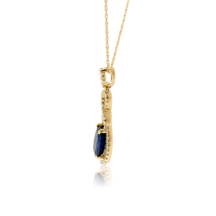 Blue Sapphire and Bypassing Style Diamond Pendant - Park City Jewelers