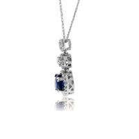 Blue Sapphire Round with Diamond Halo Pendant - Park City Jewelers