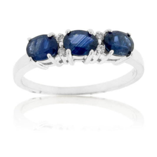 Blue Sapphire Three Stone Oval to the Side Ring - Park City Jewelers