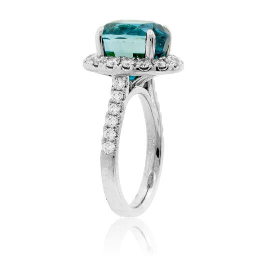 Blue Zircon, Diamond Halo and Diamond Accented Ring - Park City Jewelers