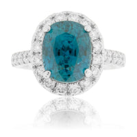 Blue Zircon, Diamond Halo and Diamond Accented Ring - Park City Jewelers
