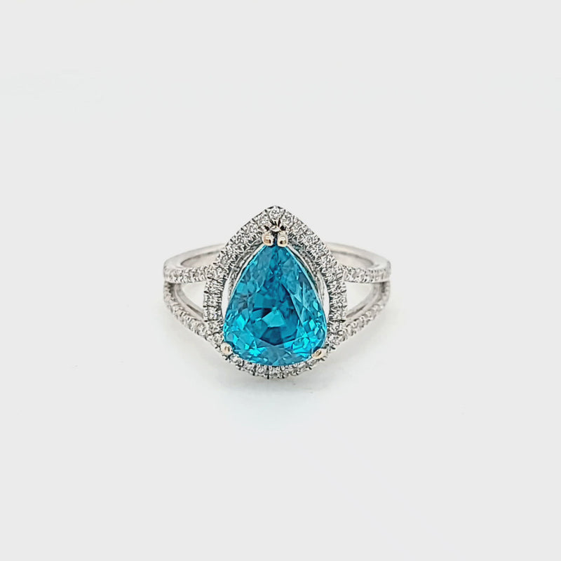 Pear Shaped Blue Zircon with Diamond Halo & Split Shank Ring