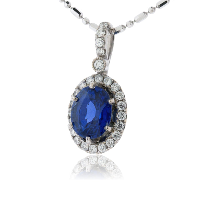 Ceylon Blue Oval Shaped Sapphire with Diamond Halo Pendant - Park City Jewelers