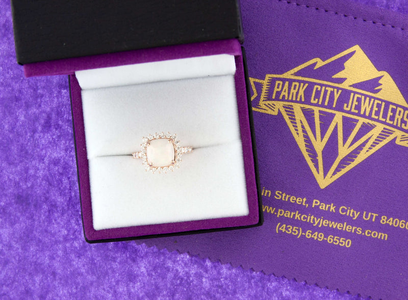 Cushion Cabochon Opal Ring with Classic Diamond Halo - Park City Jewelers