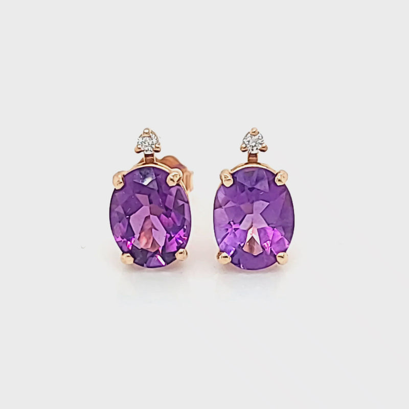 Oval Amethyst Stud Earrings with Single Diamond Accent