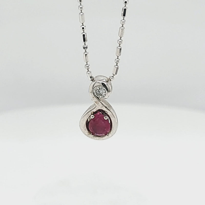 Pear Shaped Ruby Cabochon with Diamond Pendant
