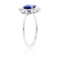 East to West Oval Cut Tanzanite and Diamond Accented Ring - Park City Jewelers