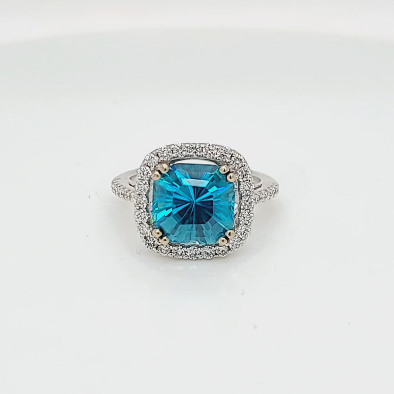 Fancy Step Cut Blue Zircon & Diamond Halo Ring