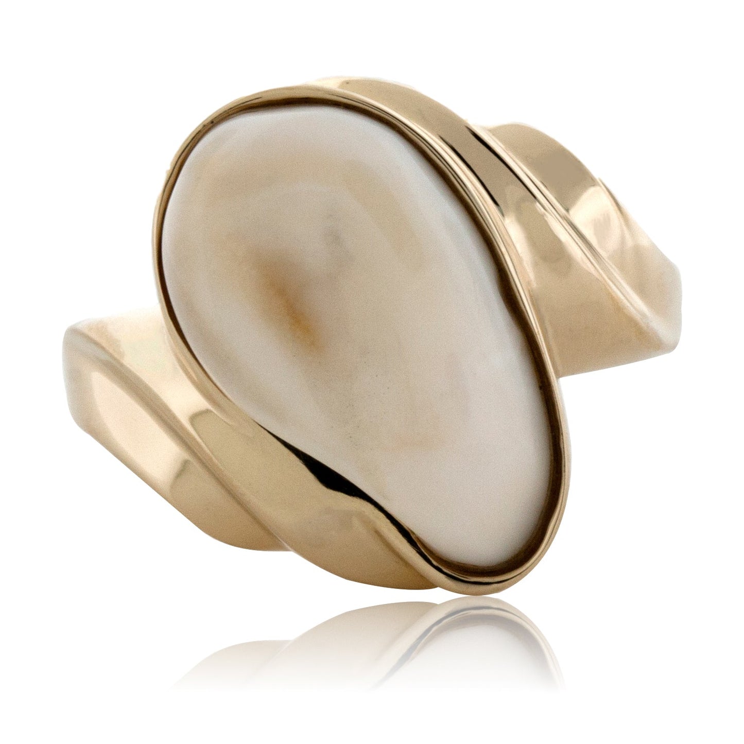 Angled view of a large, custom elk ivory ring in 14K yellow gold with a modern, sculptural wave design.