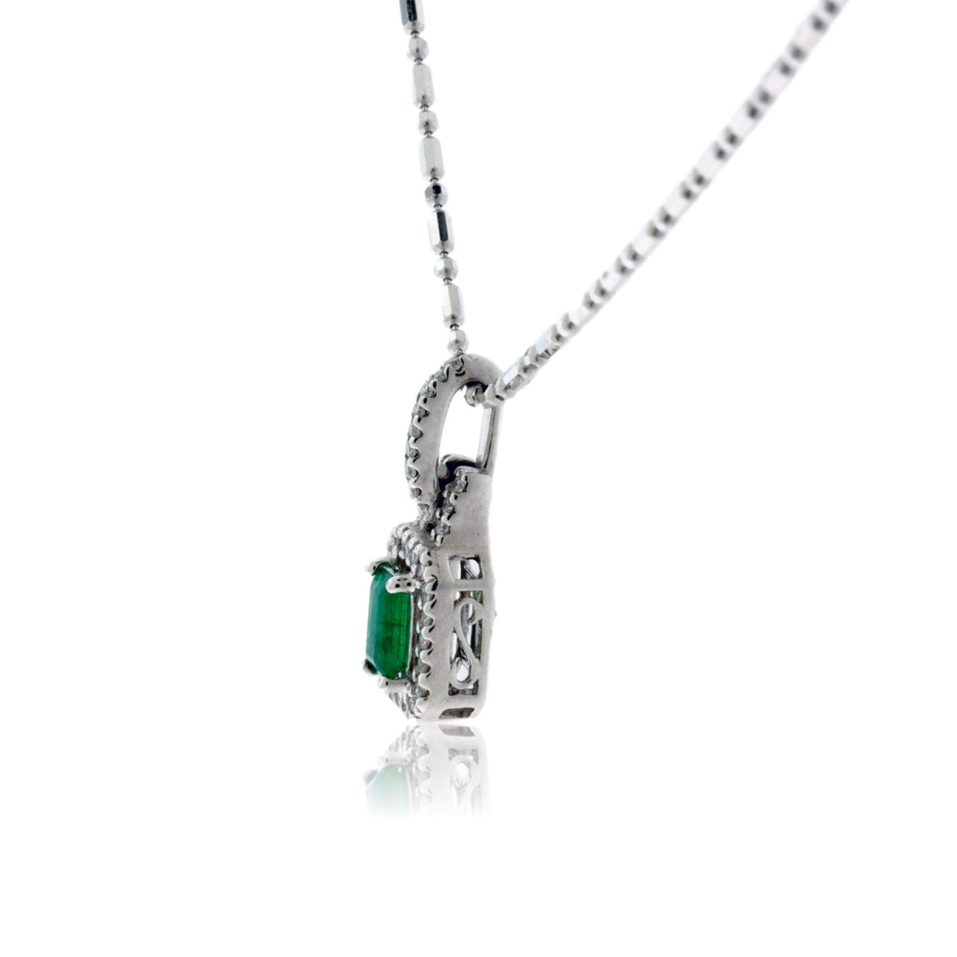 Emerald-Cut Emerald and Diamond Halo Pendant - Park City Jewelers