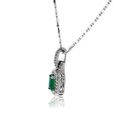 Emerald-Cut Emerald and Diamond Halo Pendant - Park City Jewelers