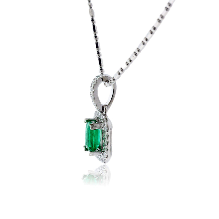 Emerald-Cut Emerald and Diamond Halo Pendant - Park City Jewelers