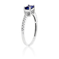 Emerald Cut Tanzanite & Diamond Lined Ring - Park City Jewelers