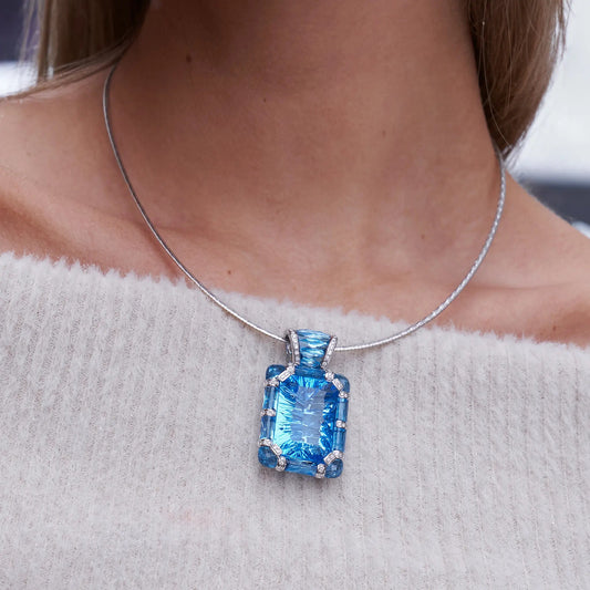Fancy Cut Blue Topaz, Blue Topaz and Diamond Accented Pendant - Park City Jewelers