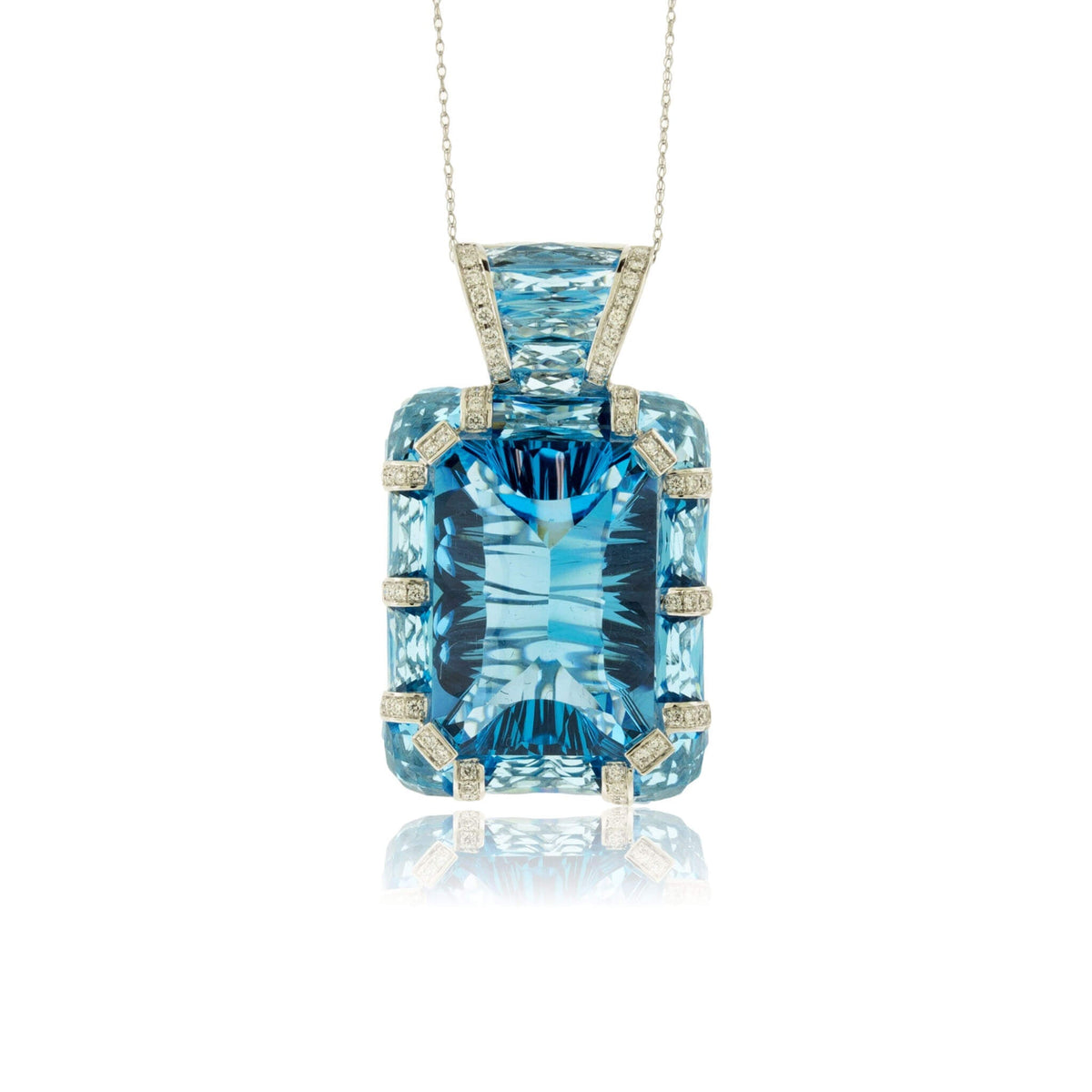 Fancy Cut Blue Topaz, Blue Topaz and Diamond Accented Pendant - Park City Jewelers