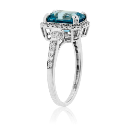 Fancy Step Cut Blue Zircon & Diamond Halo Ring - Park City Jewelers