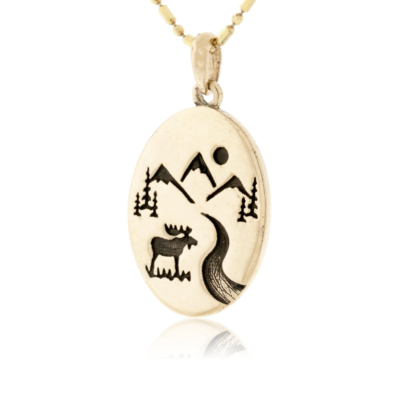 Flat Oval Mountain Scene with Tree & River Pendant - Park City Jewelers