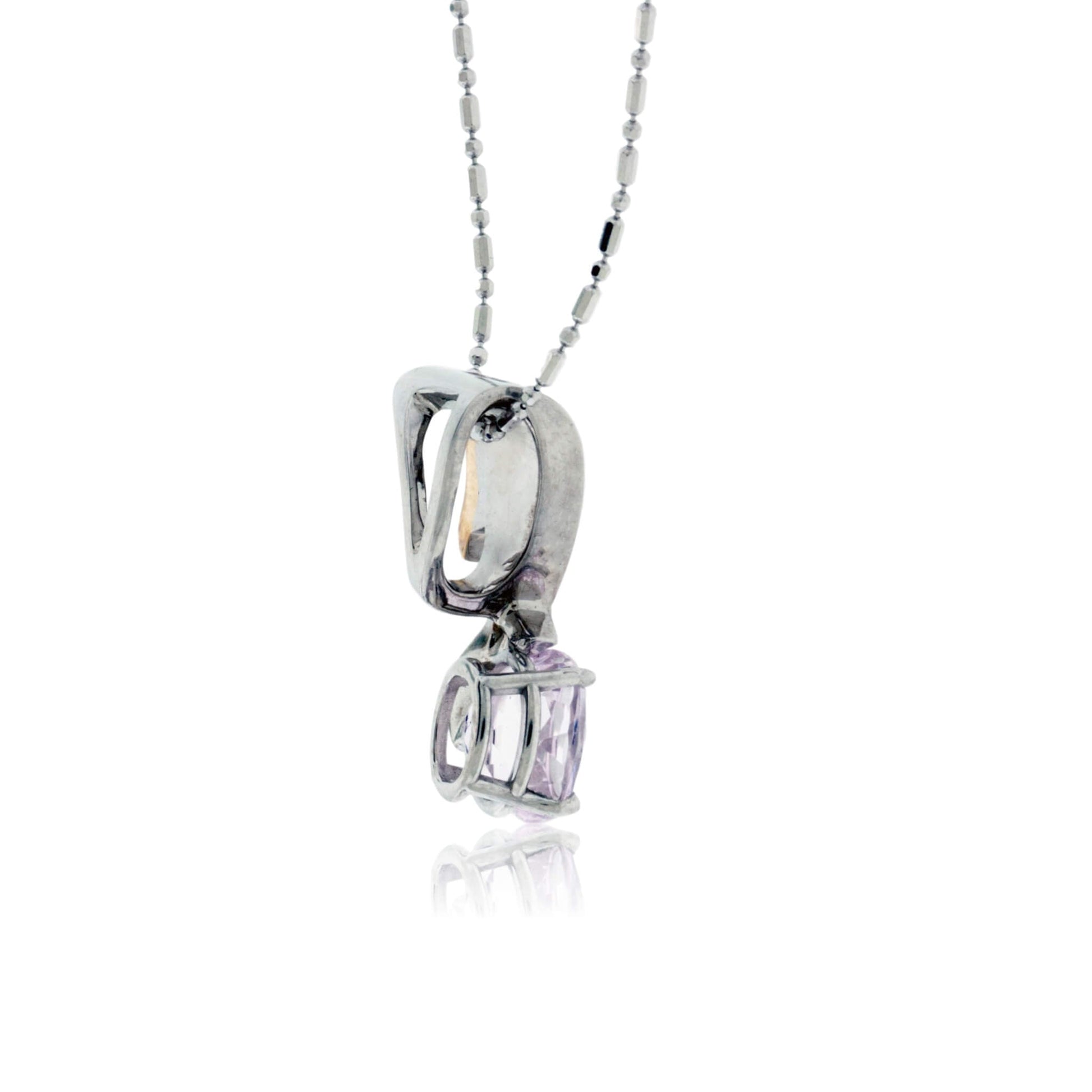 Geometrical Inlay Dinosaur Bone & Kunzite Oval Pendant - Park City Jewelers