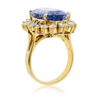 Large Oval Blue Sapphire with Round and Marquise Diamond Halo Style Ring - Park City Jewelers