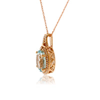 Oval Aquamarine & Diamond Halo Pendant - Park City Jewelers