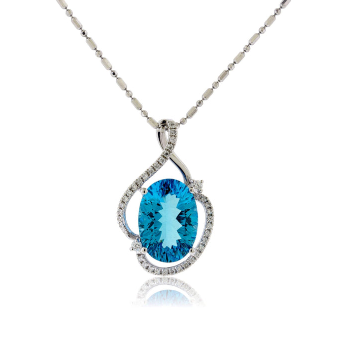 Oval Blue Topaz & Diamond Draped Pendant - Park City Jewelers