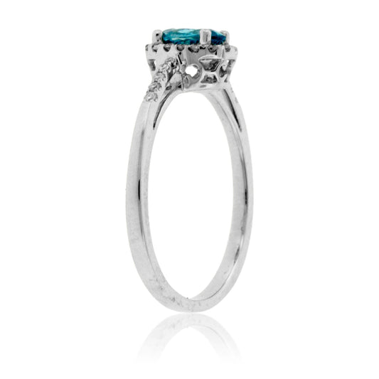 Oval Blue Zircon & Diamond Halo Ring - Park City Jewelers