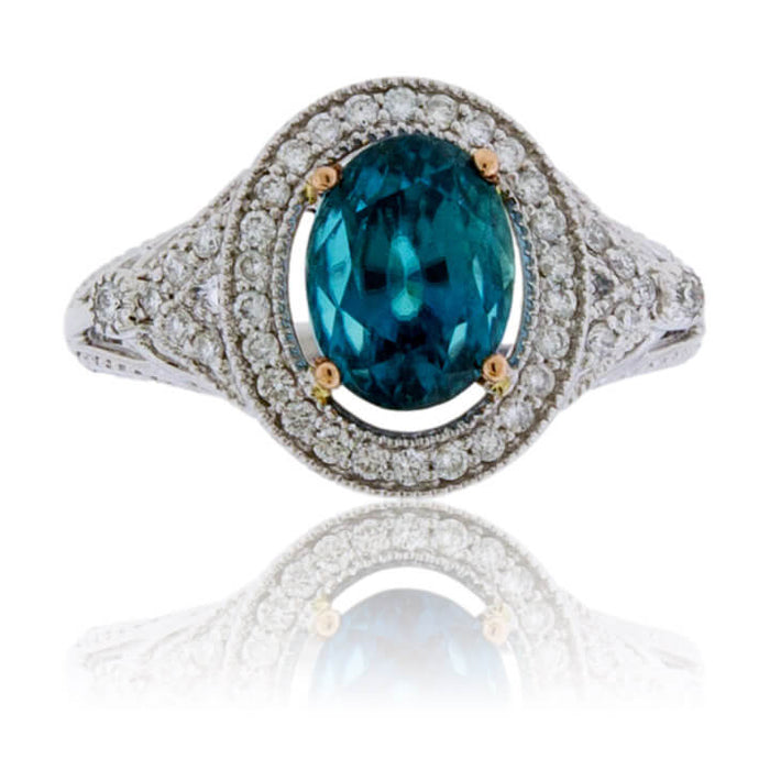 Oval Blue Zircon & Diamond Halo Ring - Park City Jewelers