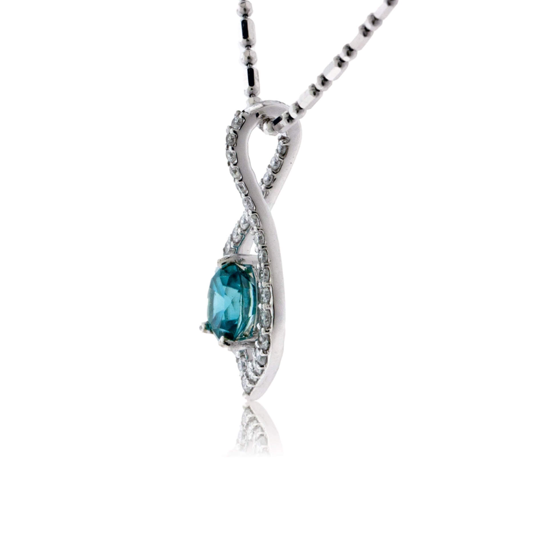 Oval Blue Zircon with Diamond Outline Pendant - Park City Jewelers