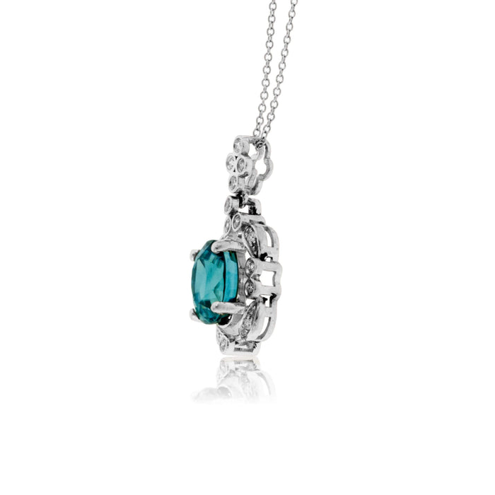 Oval Blue Zircon with Unique Diamond Halo Pendant - Park City Jewelers