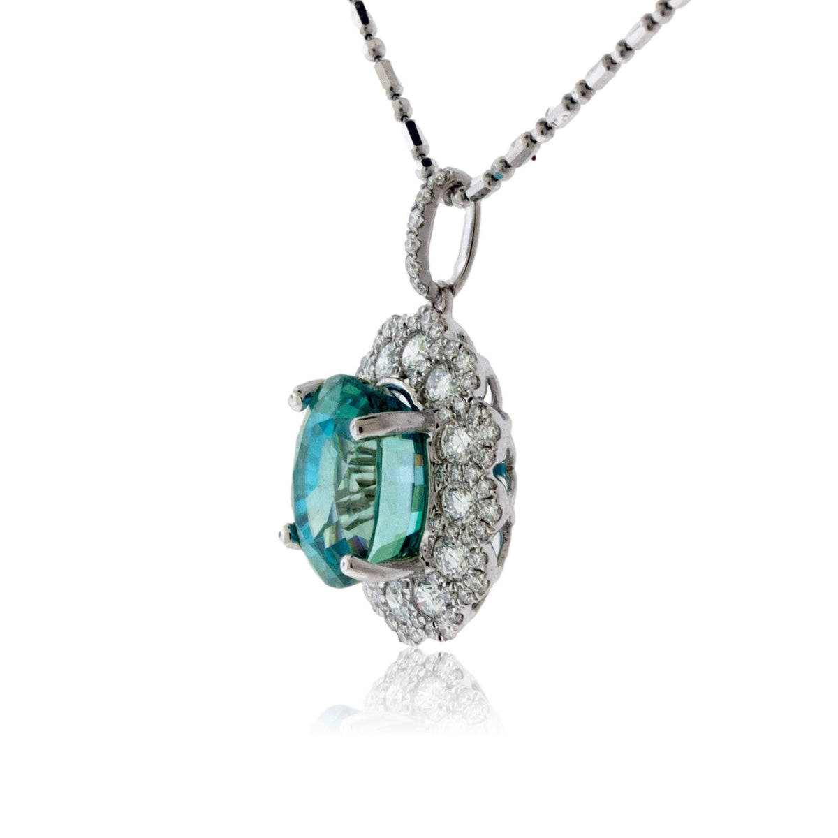 Oval Blue Zircon with Unique Diamond Halo Pendant - Park City Jewelers
