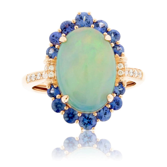 Oval Cabochon Opal Ring with Sapphire & Diamond Halo - Park City Jewelers