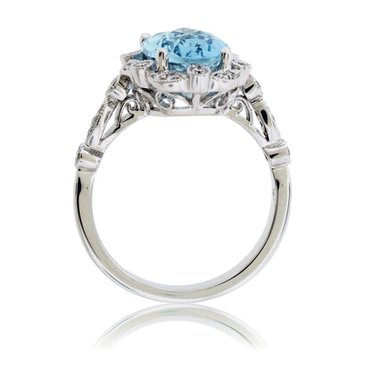 Oval-Cut Aquamarine with Scalloped Diamond Halo Ring - Park City Jewelers
