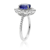 Oval Cut Tanzanite and Diamond Classic Halo Style Ring - Park City Jewelers