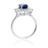 Oval Cut Tanzanite and Diamond Classic Halo Style Ring - Park City Jewelers