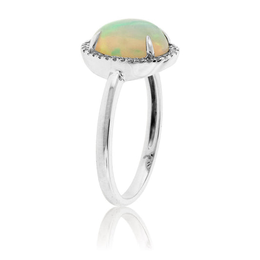 Oval Ethiopian Opal and Diamond Halo Ring - Park City Jewelers