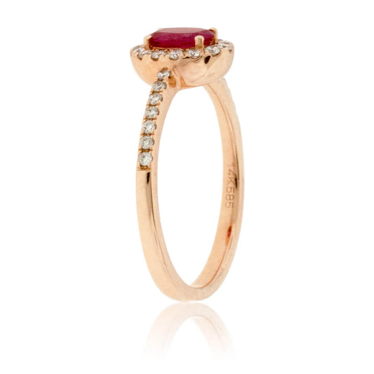 Oval Ruby and Diamond Halo Rose Gold Ring - Park City Jewelers