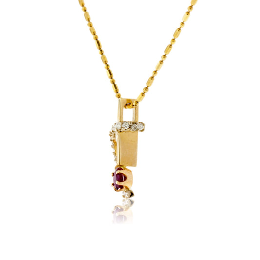 Oval Ruby and Diamond Swirl Pendant - Park City Jewelers
